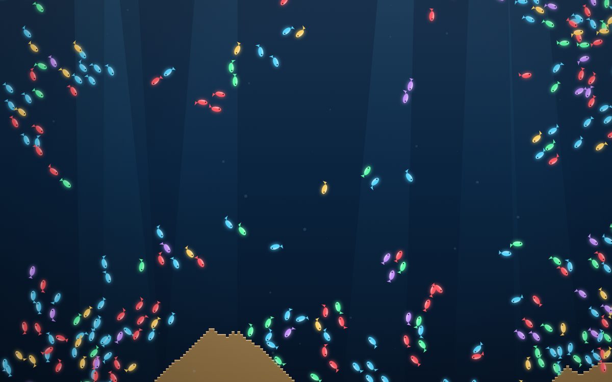 Hundreds of small glowing fish in five colors flocking through dark blue water above a sculpted sand bed, lit by drifting light rays.